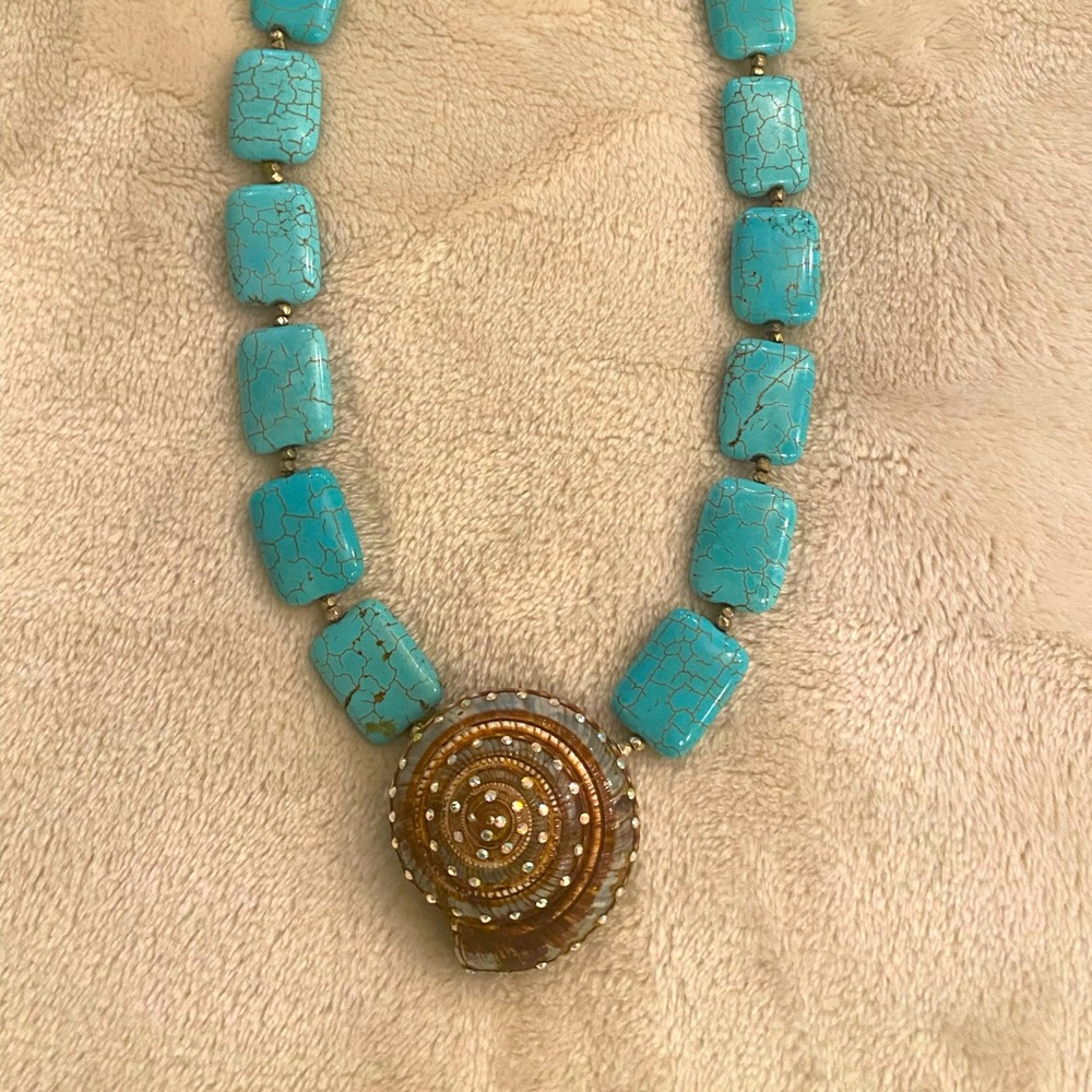 Turquoise and crystal embellished nautilus shell necklace